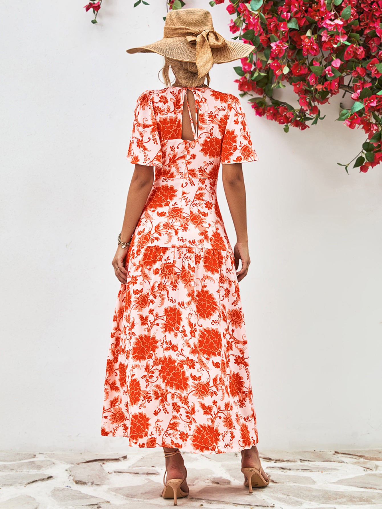 Uylee’s Boutique Floral Round Neck Tied Open Back Dress