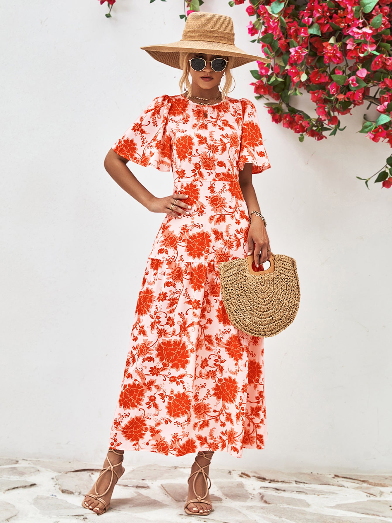 Uylee’s Boutique Floral Round Neck Tied Open Back Dress