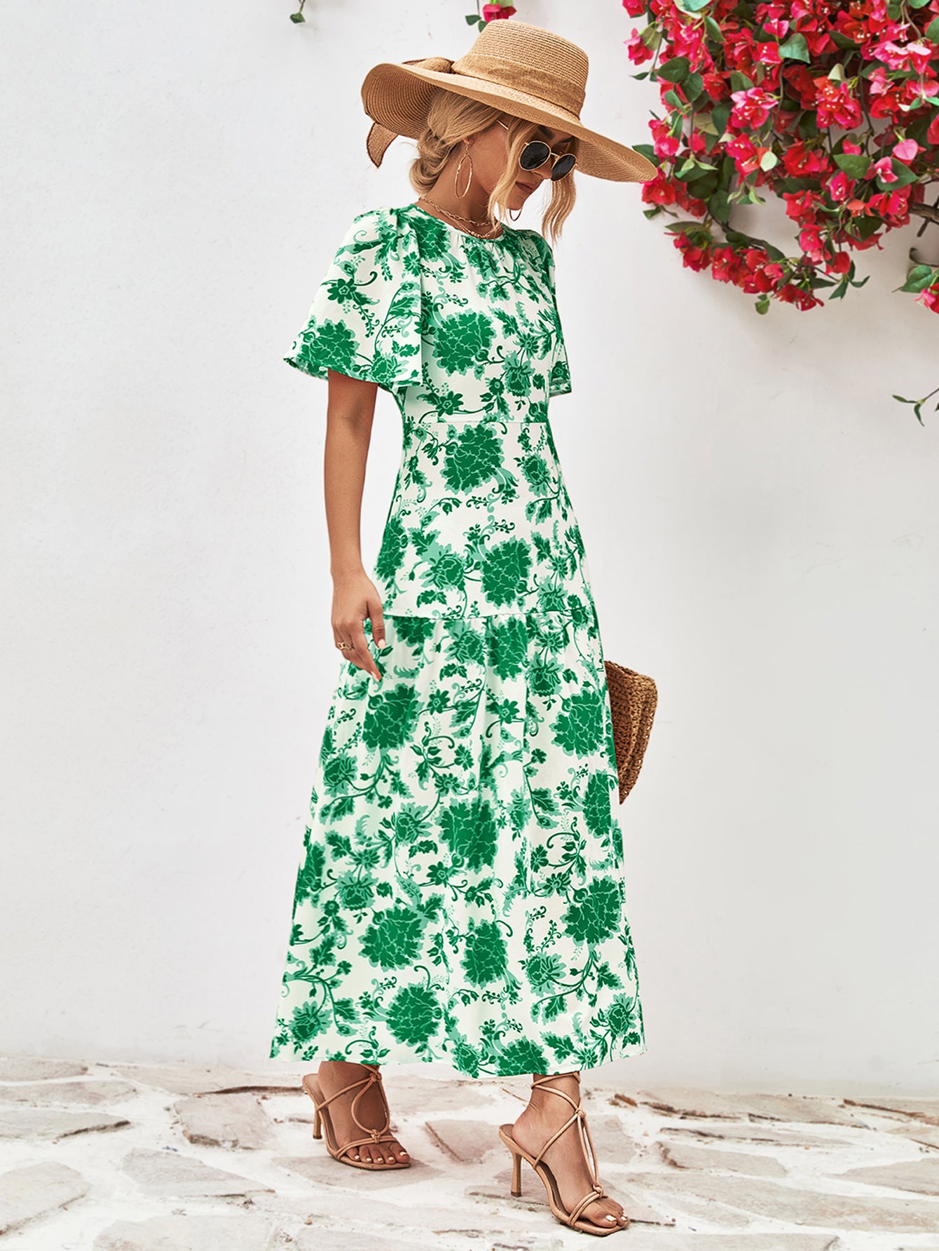 Uylee’s Boutique Floral Round Neck Tied Open Back Dress