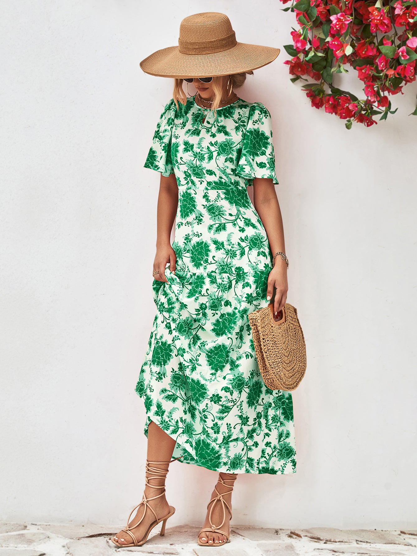 Uylee’s Boutique Floral Round Neck Tied Open Back Dress