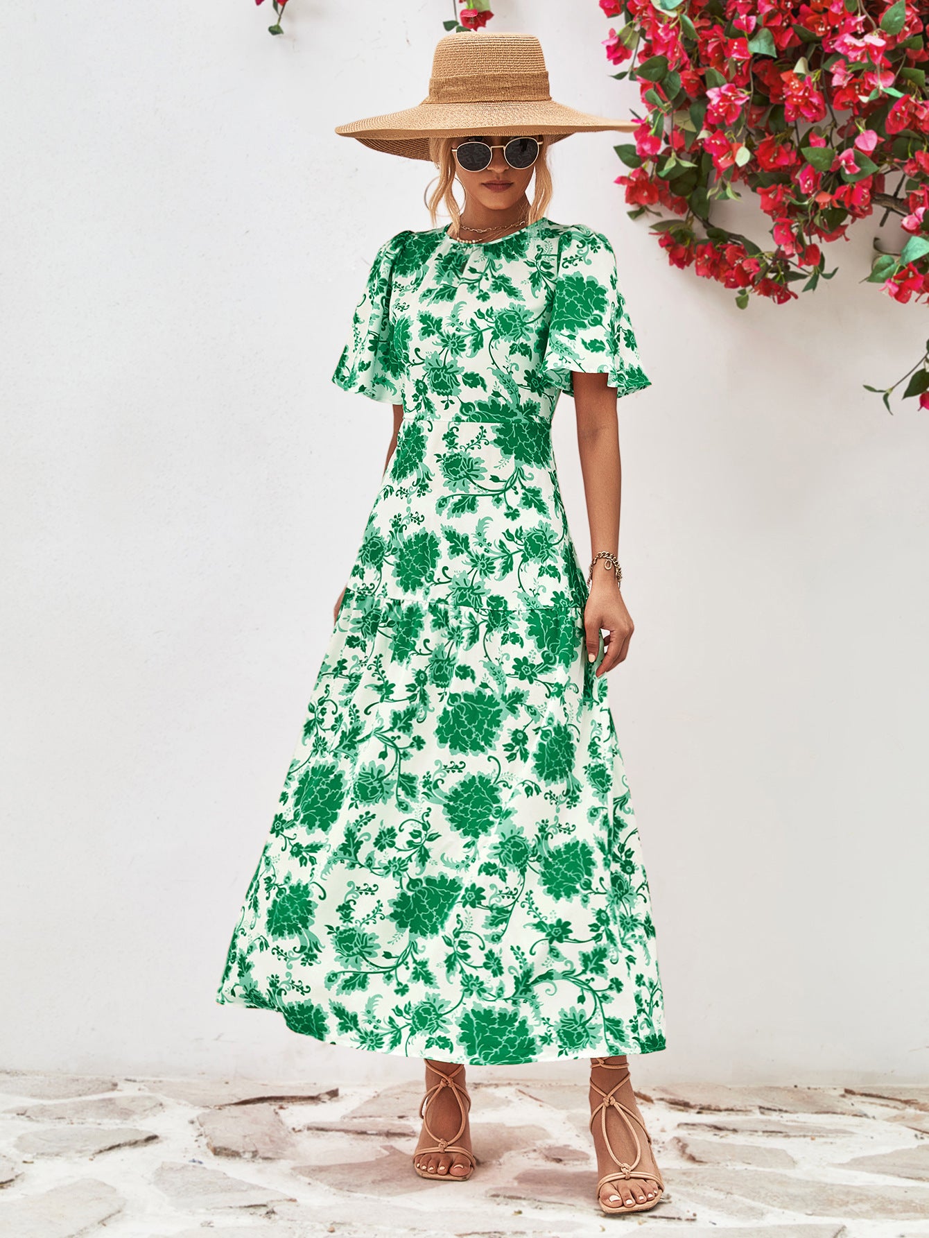 Uylee’s Boutique Floral Round Neck Tied Open Back Dress