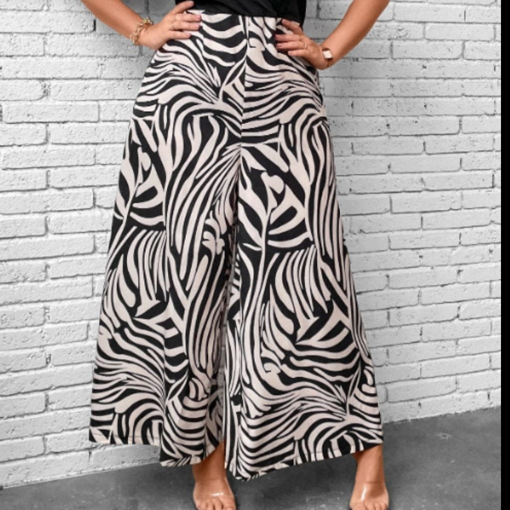 Plus Size Printed Surplice Neck Wide Leg Jumpsuit