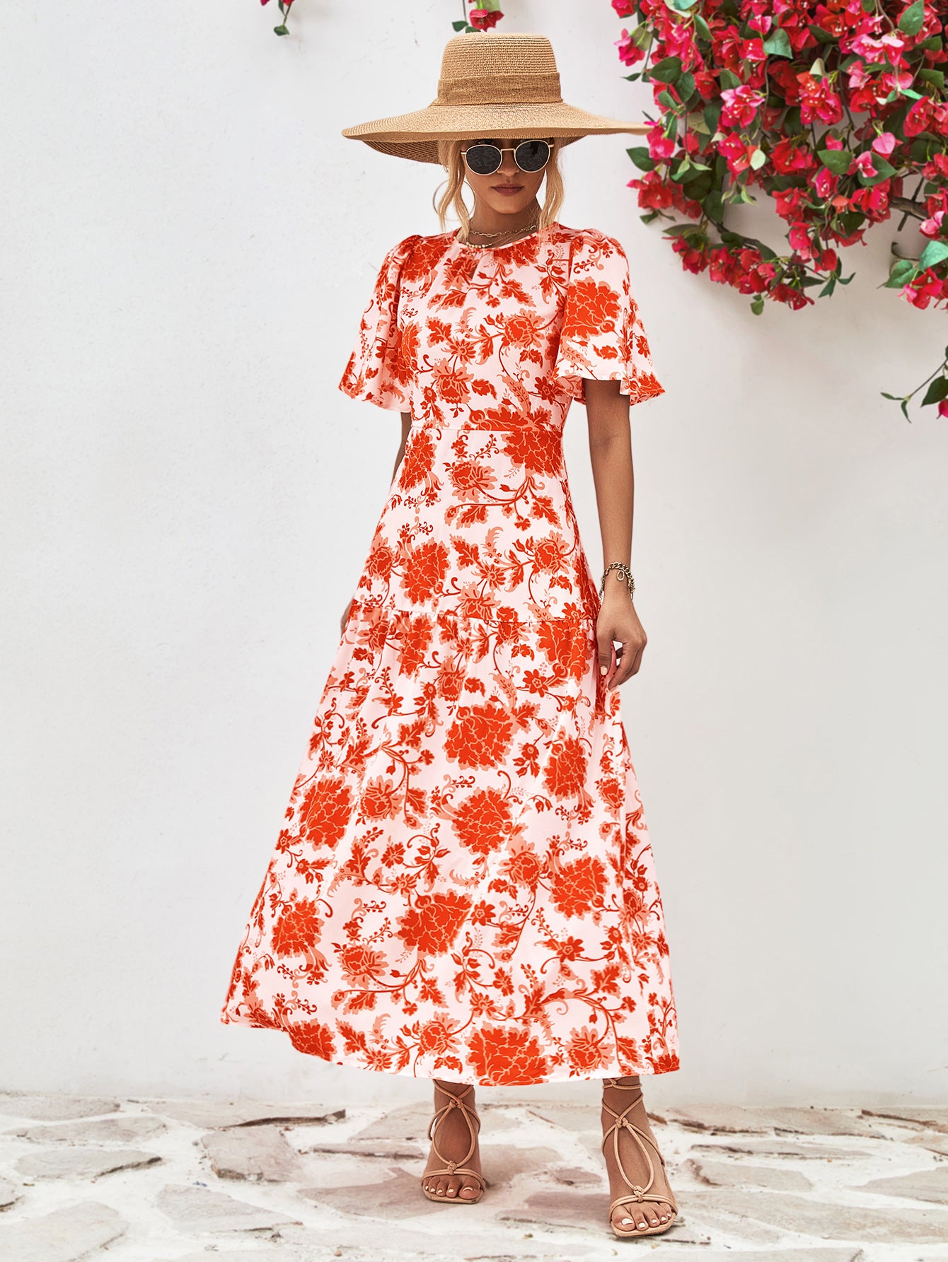 Uylee’s Boutique Floral Round Neck Tied Open Back Dress