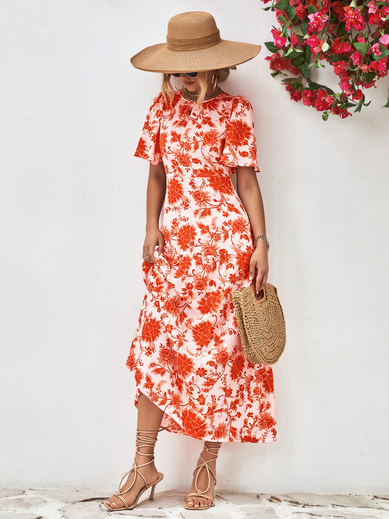 Uylee’s Boutique Floral Round Neck Tied Open Back Dress