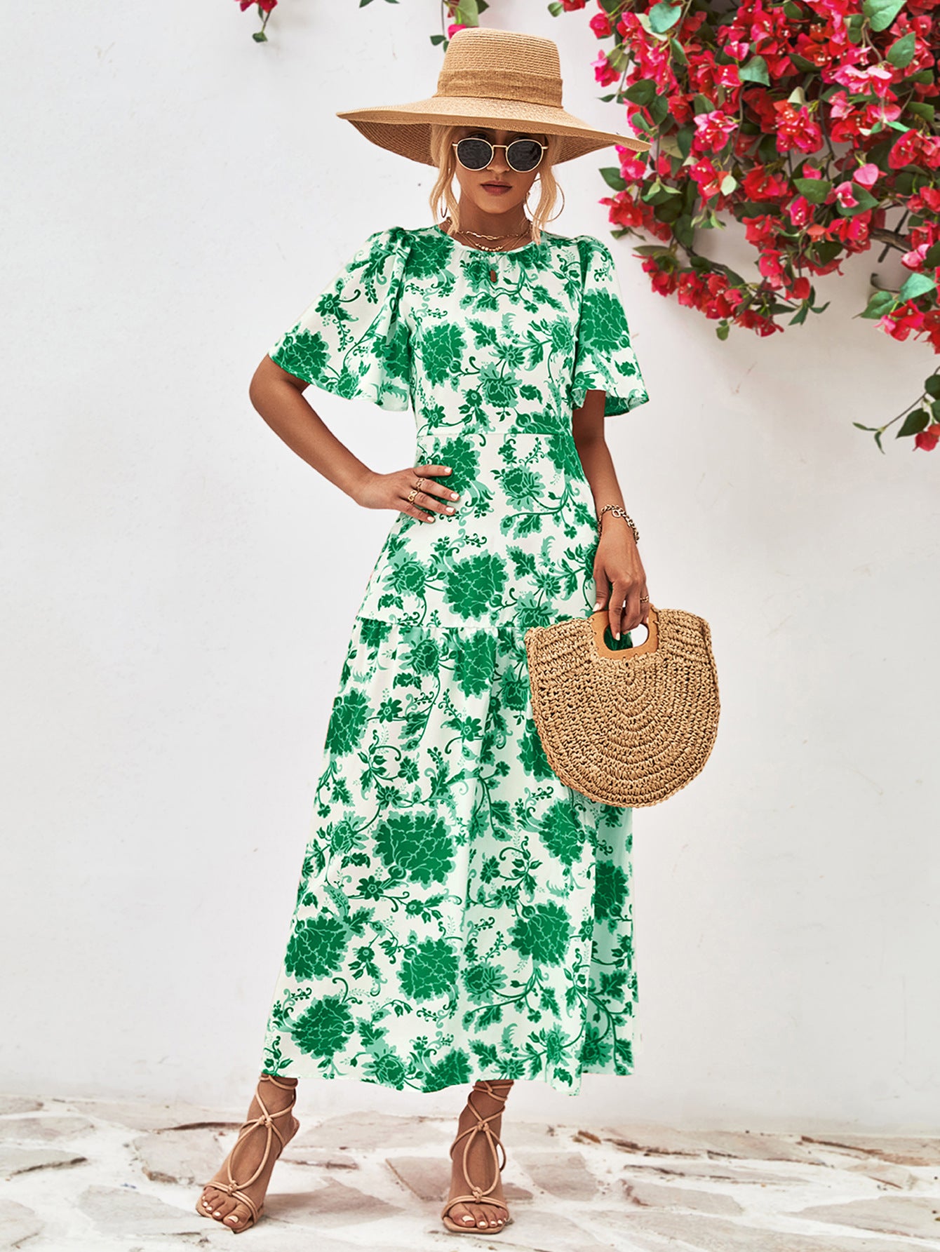 Uylee’s Boutique Floral Round Neck Tied Open Back Dress