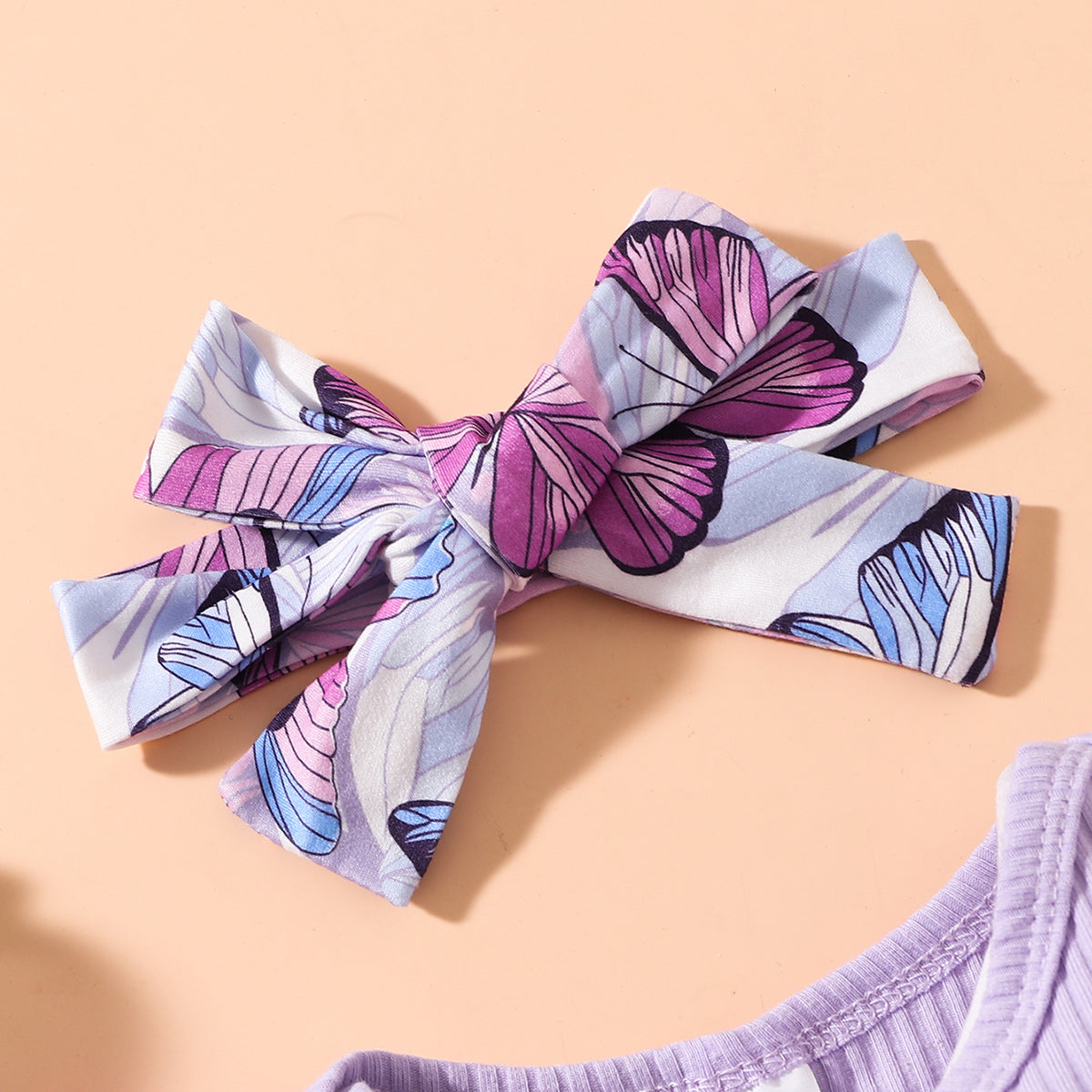Uylee’s Boutique Ribbed Ruffle Shoulder Bodysuit and Butterfly Print Shorts Set