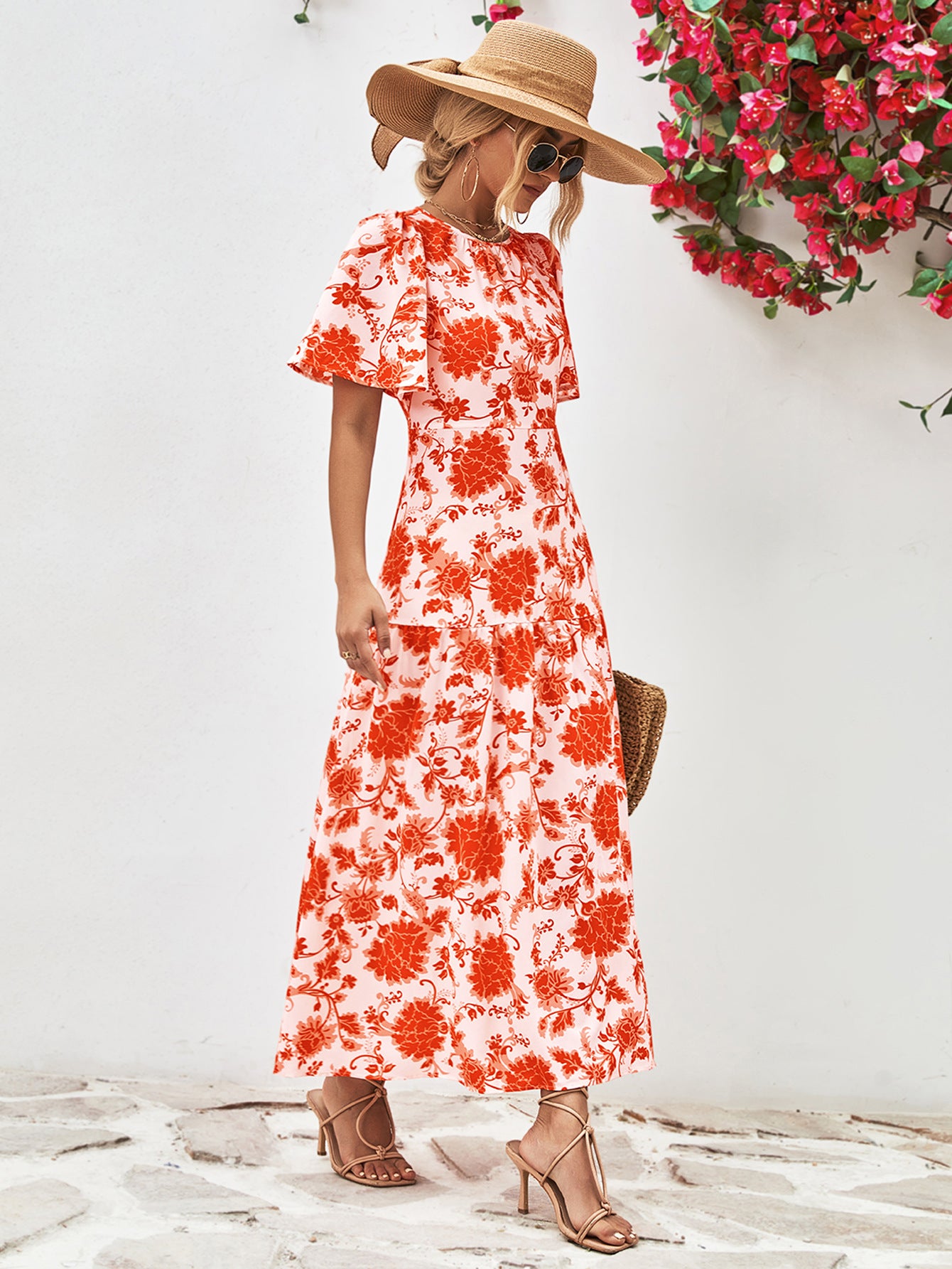 Uylee’s Boutique Floral Round Neck Tied Open Back Dress