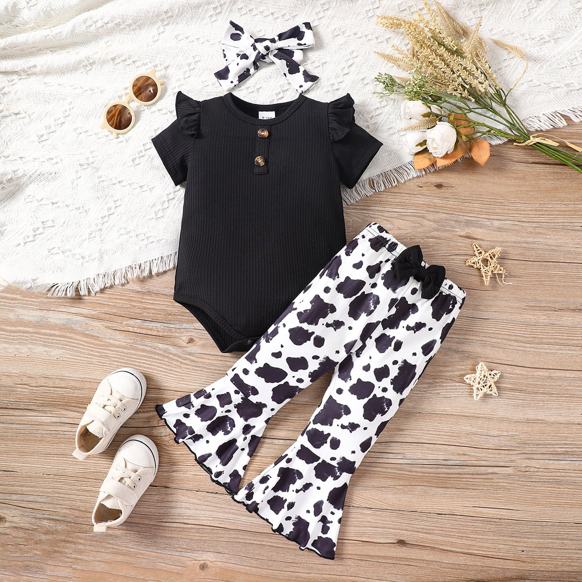 Uylee's Boutique Decorative Button Ribbed Bodysuit and Printed Flare Pants Set
