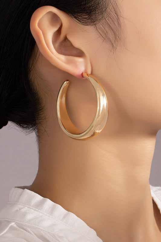 Large hollow puffy hoop earrings