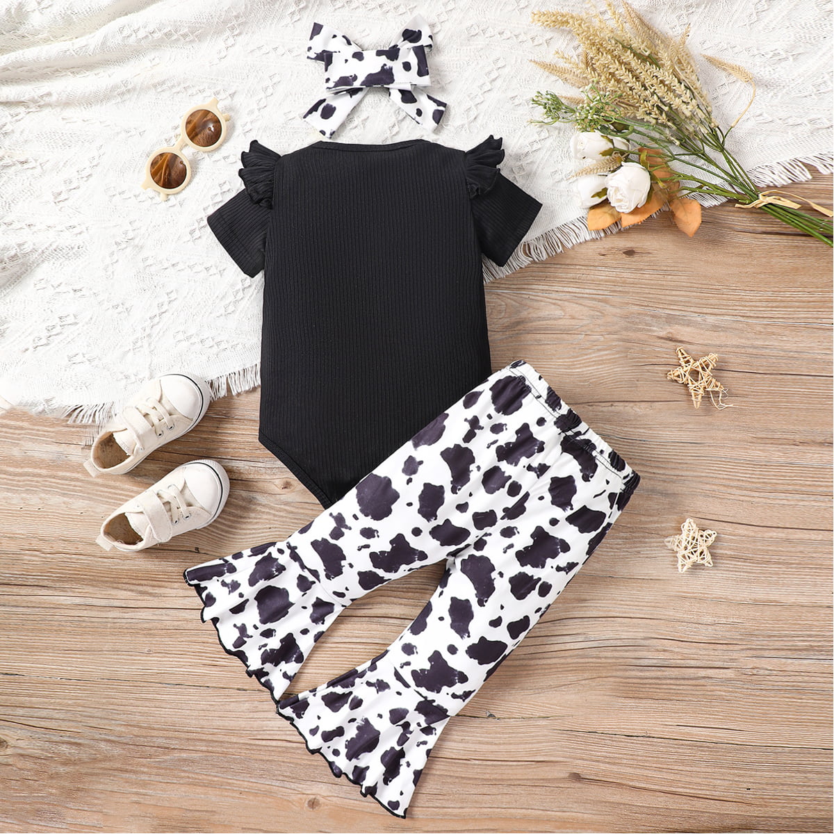 Uylee's Boutique Decorative Button Ribbed Bodysuit and Printed Flare Pants Set