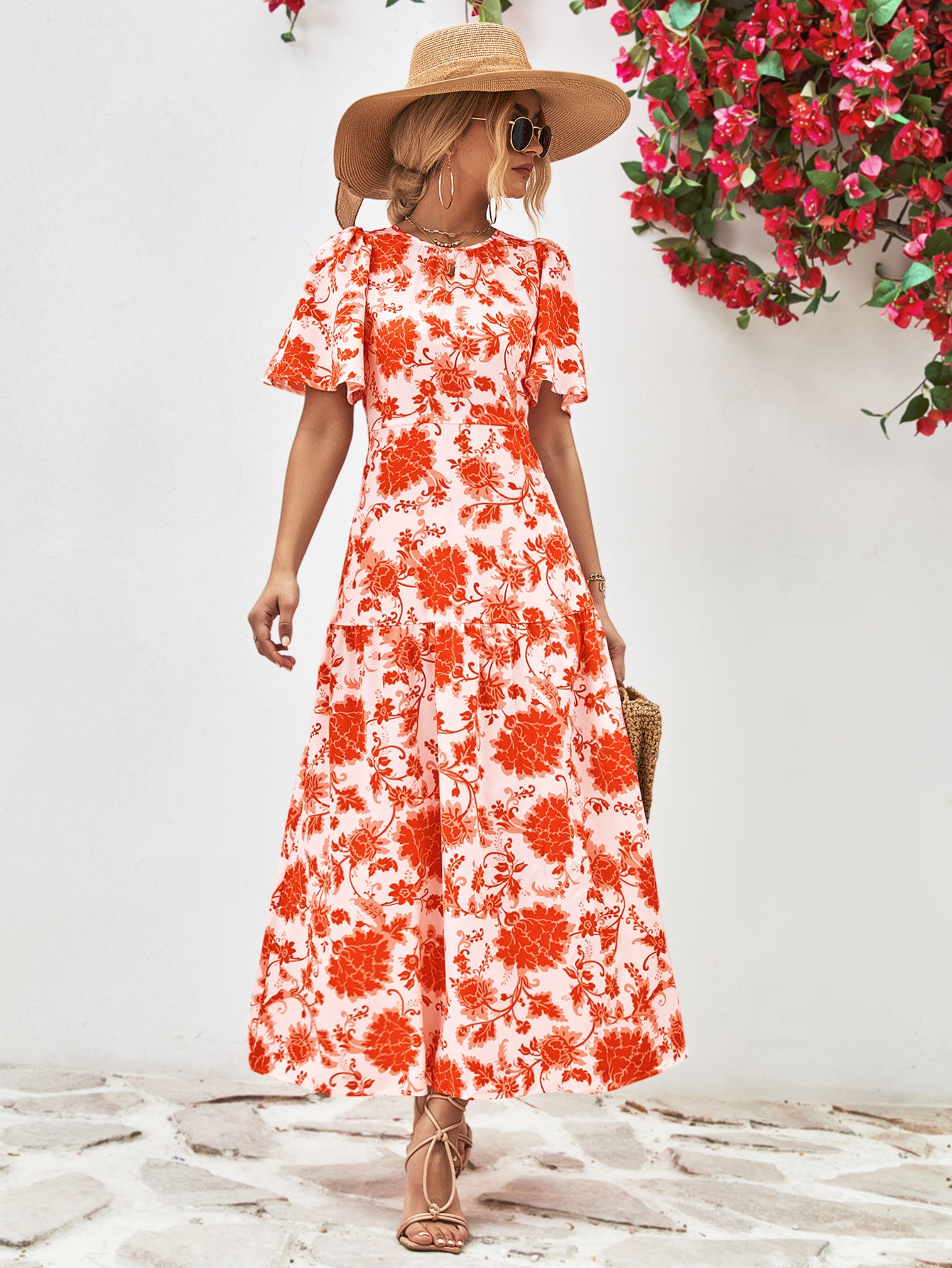 Uylee’s Boutique Floral Round Neck Tied Open Back Dress